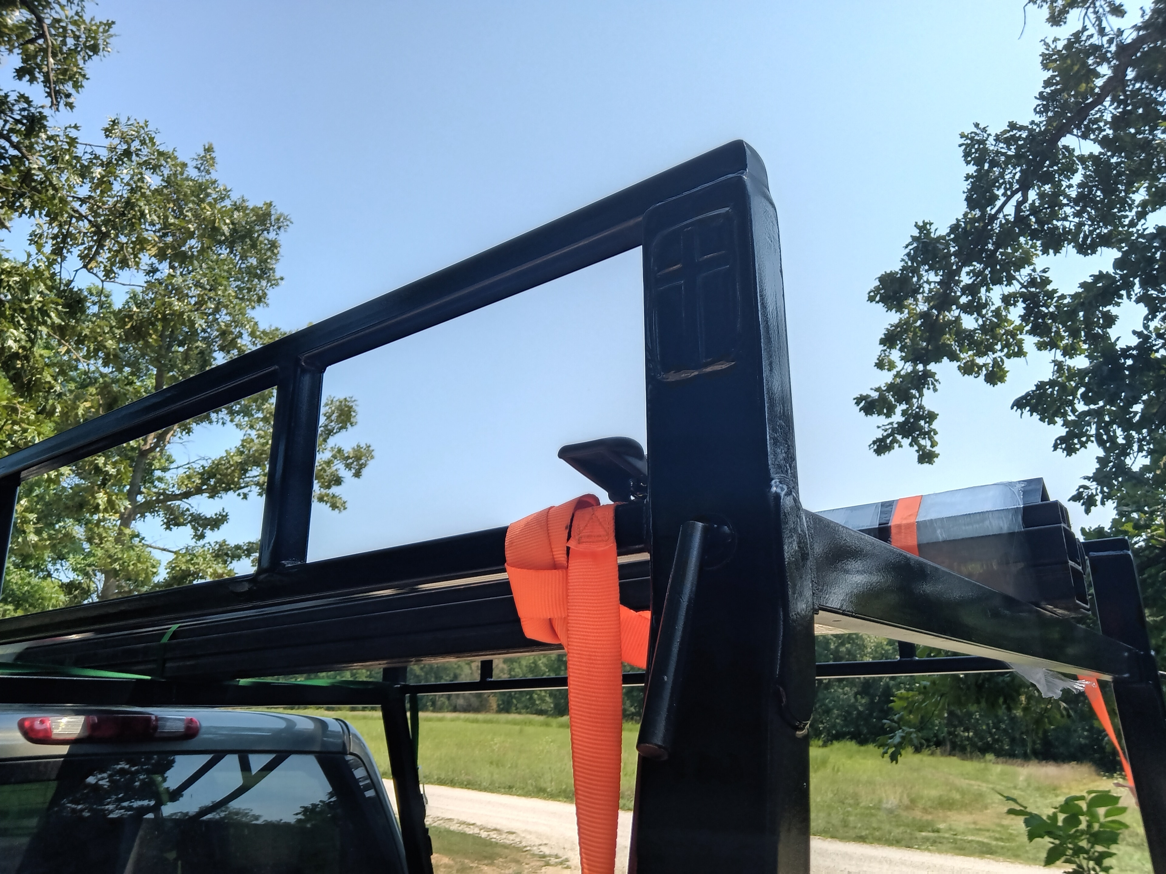 T~RAX rack corner weld and strap hook detail
