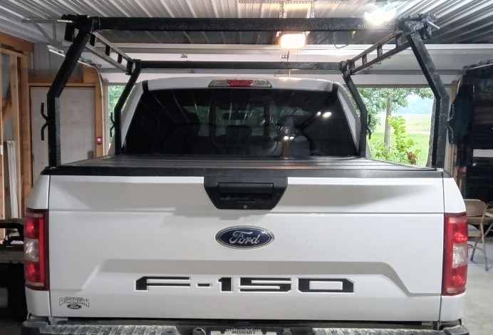 T~RAX rack on white Ford F-150, rear view