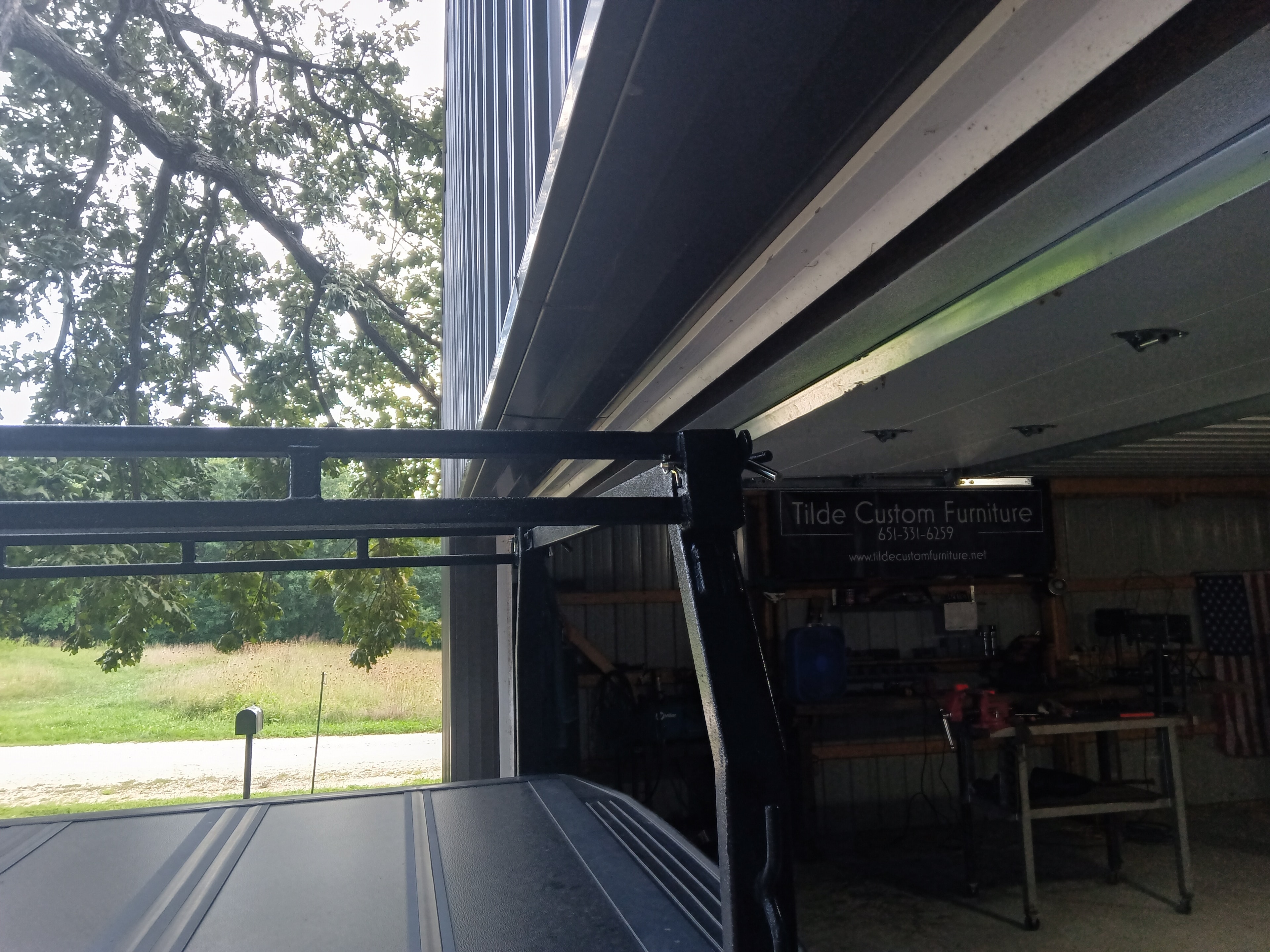 T~RAX rack framing detail with Tilde shop in background