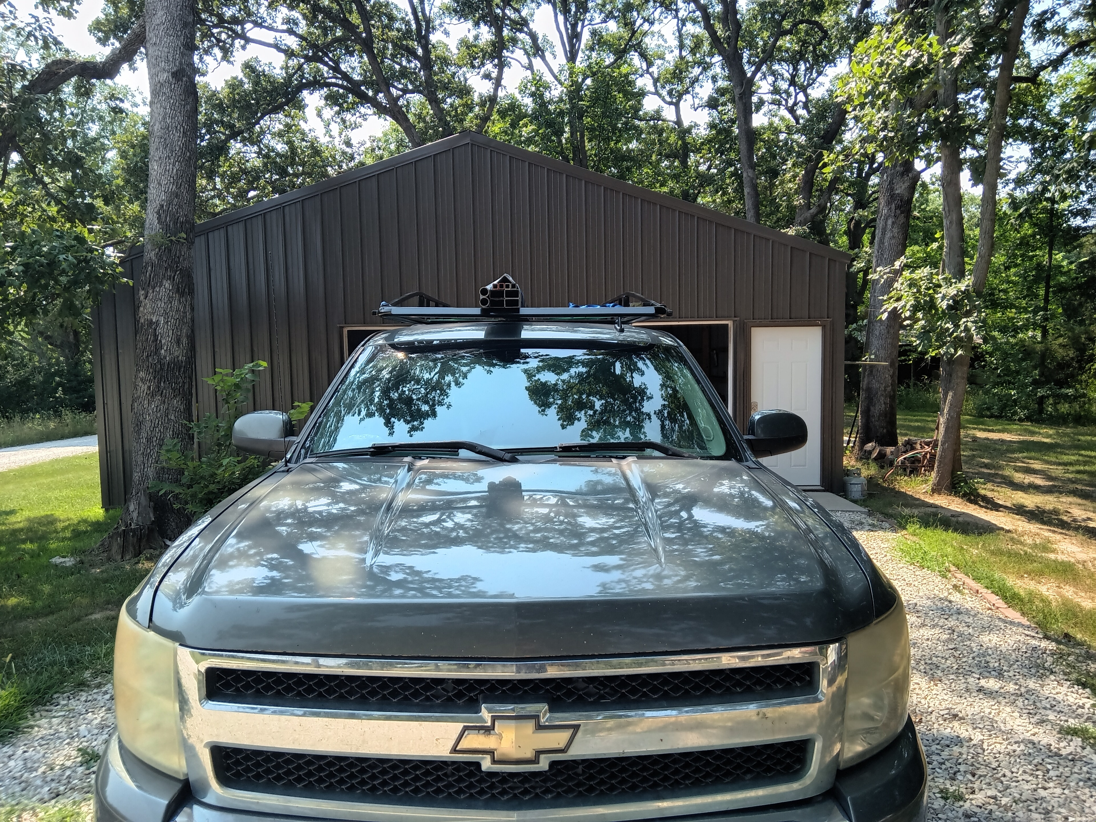 T~RAX rack on grey Silverado 4x4, front view
