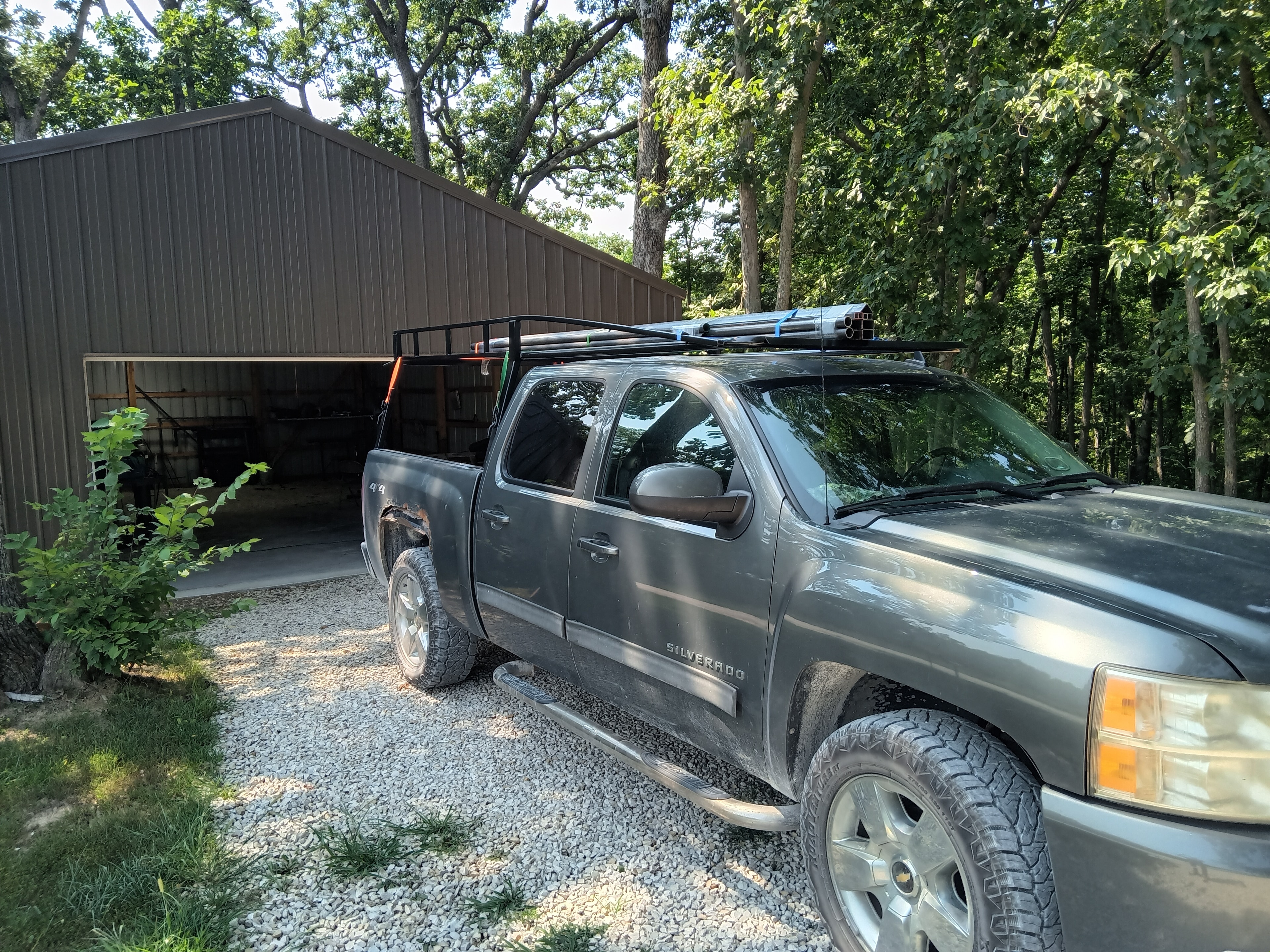 T~RAX rack on grey Silverado 4x4, rear angle